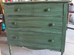 A small green dresser, very good condition, purchased at the same estate sale as the mirror.